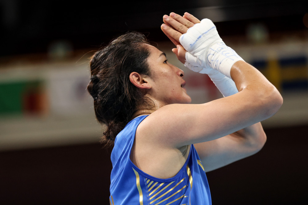 埃及拳击选手意气风发，闯入半决赛